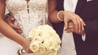 Groom Carries Wounded Bride Down the Aisle